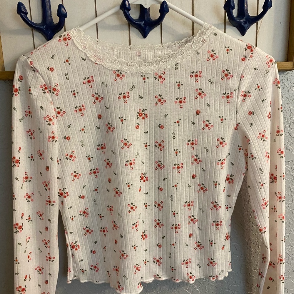 SHEIN size medium white long sleeve with flower design.